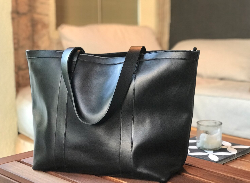 buying a black leather bag